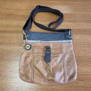 The Sak Two-Tone Leather Crossbody Bag in chocolate and camel brown.